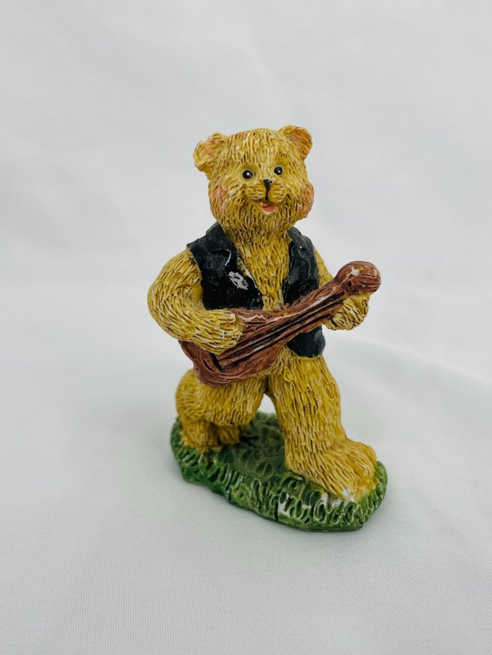 Vintage 1990s Musical Bear with Black Vest Playing Guitar